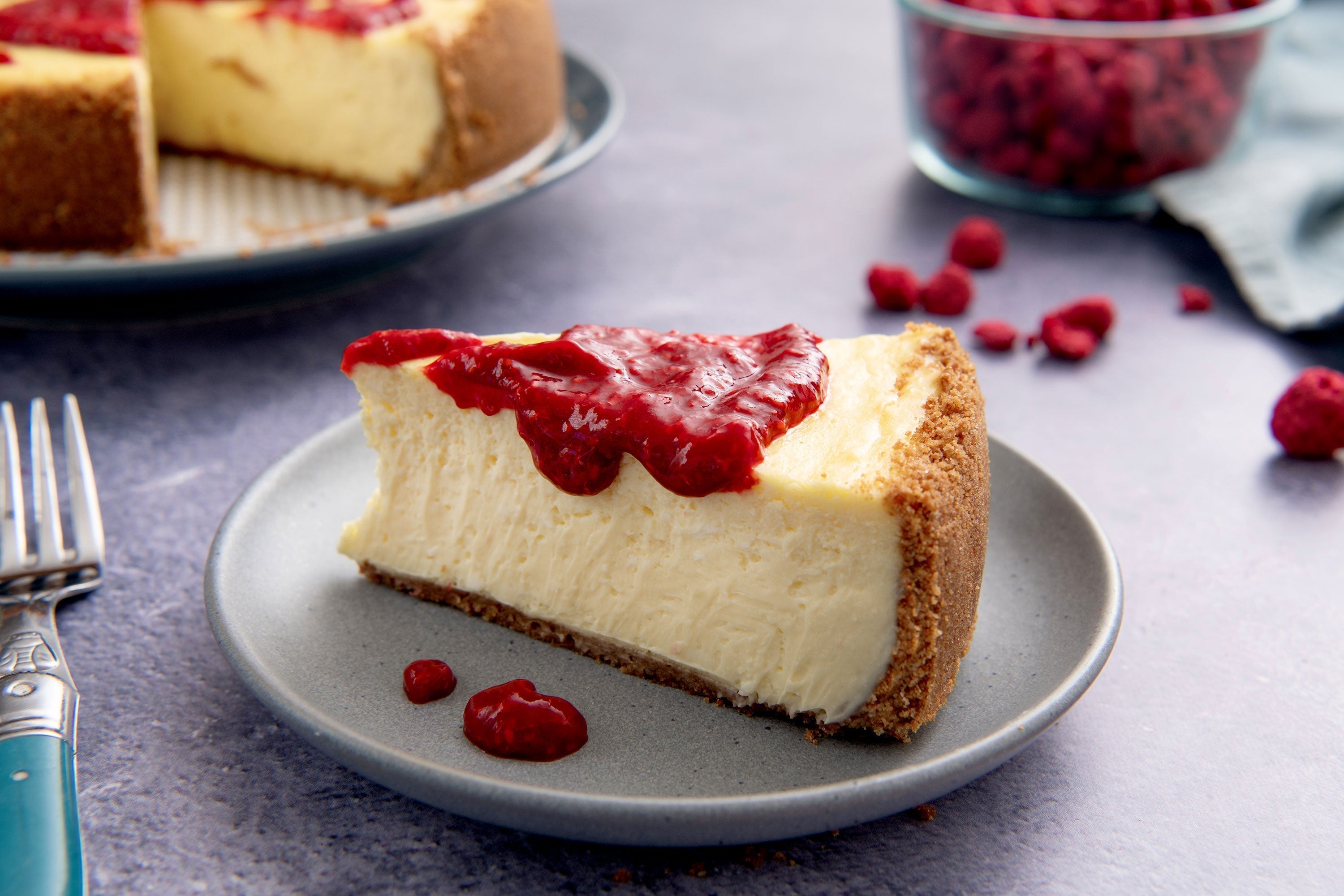 New York-style baked cheesecake with raspberry sauce recipe